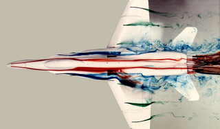 Illustration for article titled NASA Put a Model F-18 in a Water Tunnel—And It Looked Spectacular